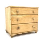 20th century pine chest of three deep drawers, with turned pull handles and bun supports, W98cm, H8