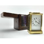 Late 19th century four glass brass carriage clock, white enamel dial with Roman numeral chapter rin