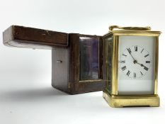 Late 19th century four glass brass carriage clock, white enamel dial with Roman numeral chapter rin