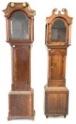 Georgian oak longcase clock case, (H224cm) and another longcase (216cm)