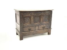 18th century oak mule chest, plain hinged lid with moulded edge above scroll carved frieze and thre