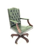 Modern mahogany open arm office chair, upholstered in deep buttoned green leather, moulded arm supp