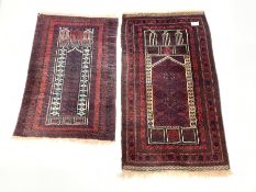 Afghan Belouch prayer rug, central mihrab panel enclosed by guarded border, (80cm x 146cm) together