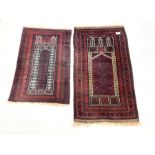 Afghan Belouch prayer rug, central mihrab panel enclosed by guarded border, (80cm x 146cm) together