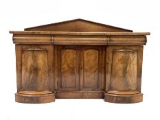 Victorian mahogany sideboard, with arched pediment over three cushion fronted frieze drawers and fo