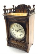 Late 19th century oak cased mantel clock, galleried top with shield and scroll carved raised back,