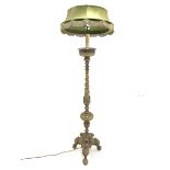 Early 20th century gilt bronze two branch standard lamp, column decorated with water leaves, raised