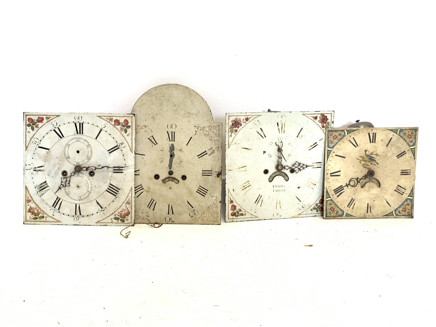 Three eight day white painted enamel longcase clock dial and movements, and a 30 hour dial and move