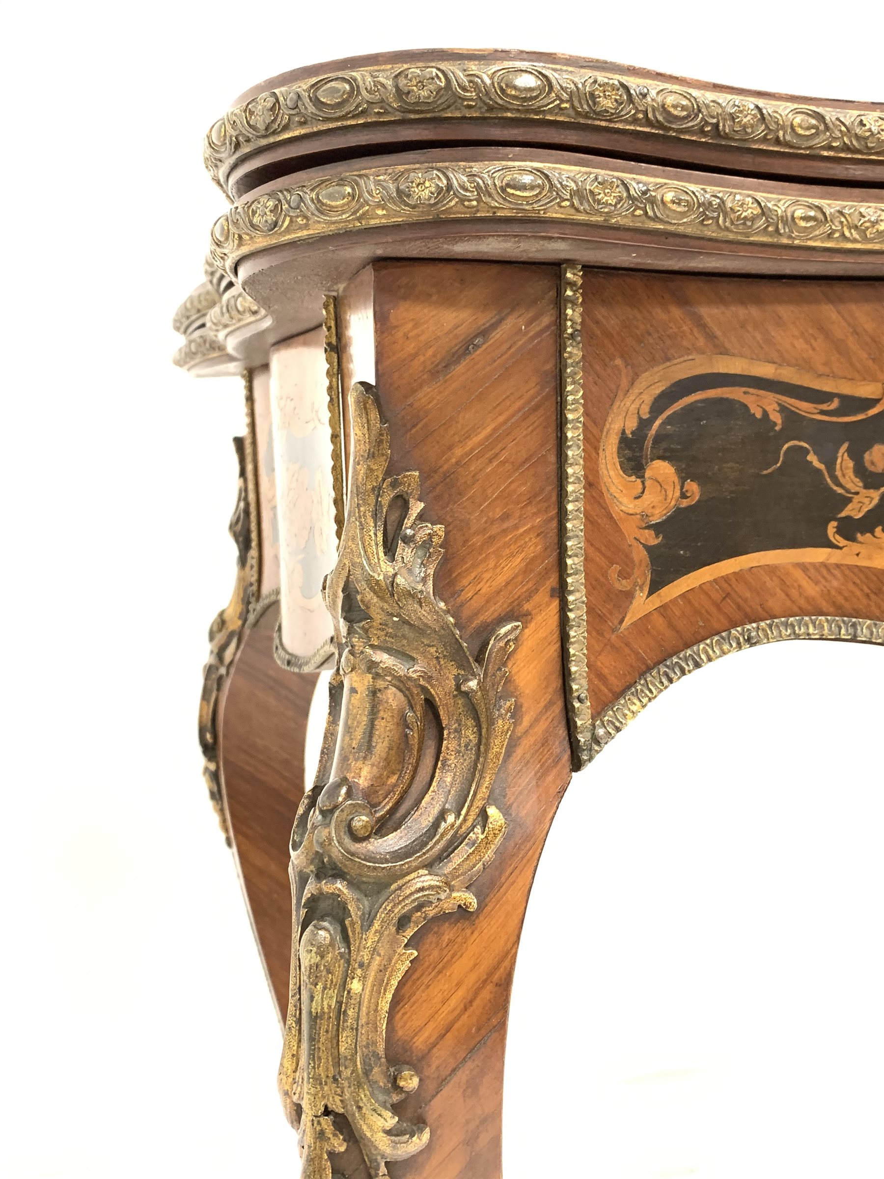 19th century French kingwood marquetry games table, the serpentine floral inlaid fold over revolvin - Image 5 of 10