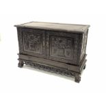 Late 19th century Chinese carved rosewood two door cupboard, profusely carved with trailing leaf s