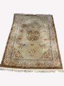 Chinese beige wool ground carpet, central medallion surrounded by stylized butterflies and vines, g