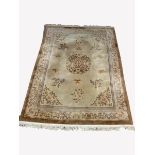 Chinese beige wool ground carpet, central medallion surrounded by stylized butterflies and vines, g