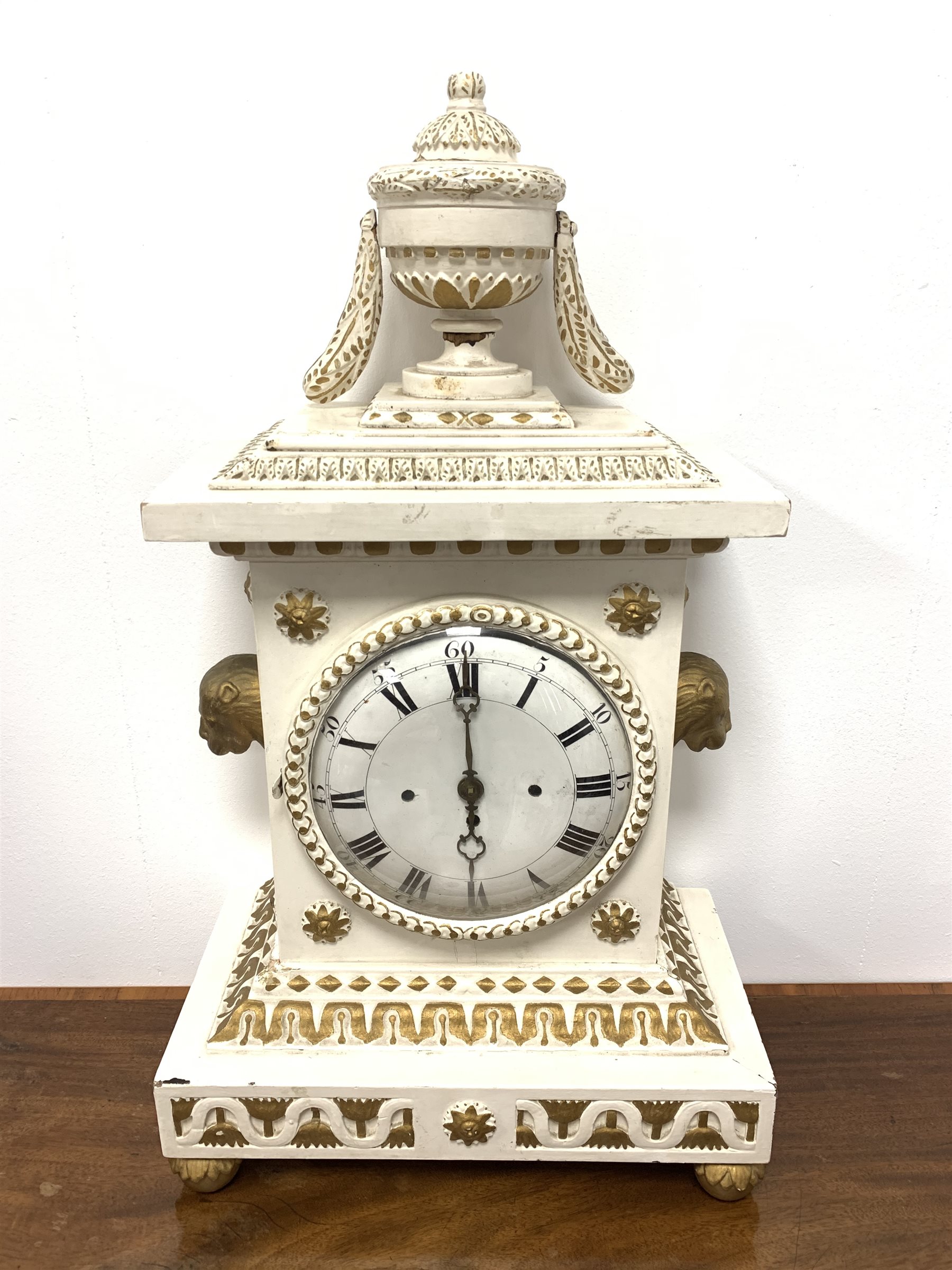 19th century white and gold painted mantel clock, the case with urn finial over egg and dart cornic