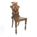 Victorian oak hall chair with scroll carved and pierced backs, shaped seats and turned front suppor