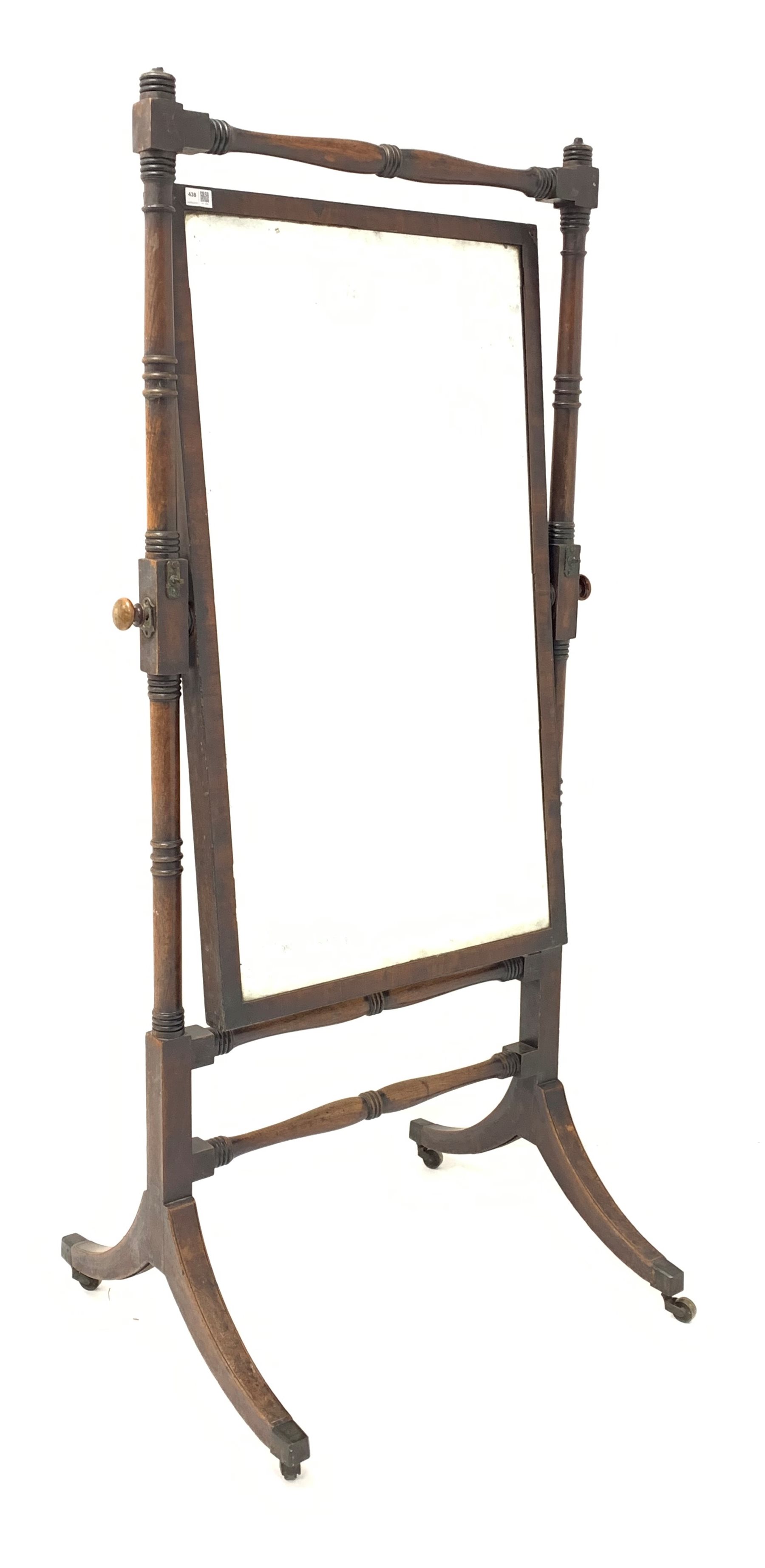 Mahogany Cheval mirror circa 1820, with ring turned supports and stretchers raised on splayed base