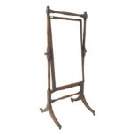 Mahogany Cheval mirror circa 1820, with ring turned supports and stretchers raised on splayed base