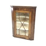 19th century oak and mahogany banded corner cupboard, boxwood inlaid frieze, astragal glazed door e