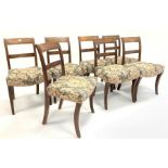 Set seven Georgian mahogany dining chairs with bar backs and reeded decoration over upholstered sea