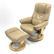 Ekornes Stressless leather upholstered reclining armchair with stool,