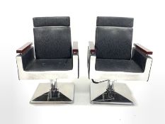 Pair tattoo artist chairs with reclining backs and chrome swivel bases, W63cm