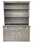 Solid pine painted dresser, three height plate rack over two drawer and two cupboards with ceramic