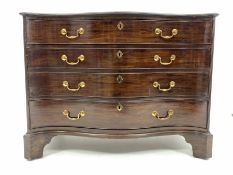 Georgian design mahogany serpentine front chest of four graduating drawers enclosed by canted flute