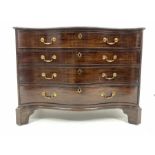 Georgian design mahogany serpentine front chest of four graduating drawers enclosed by canted flute