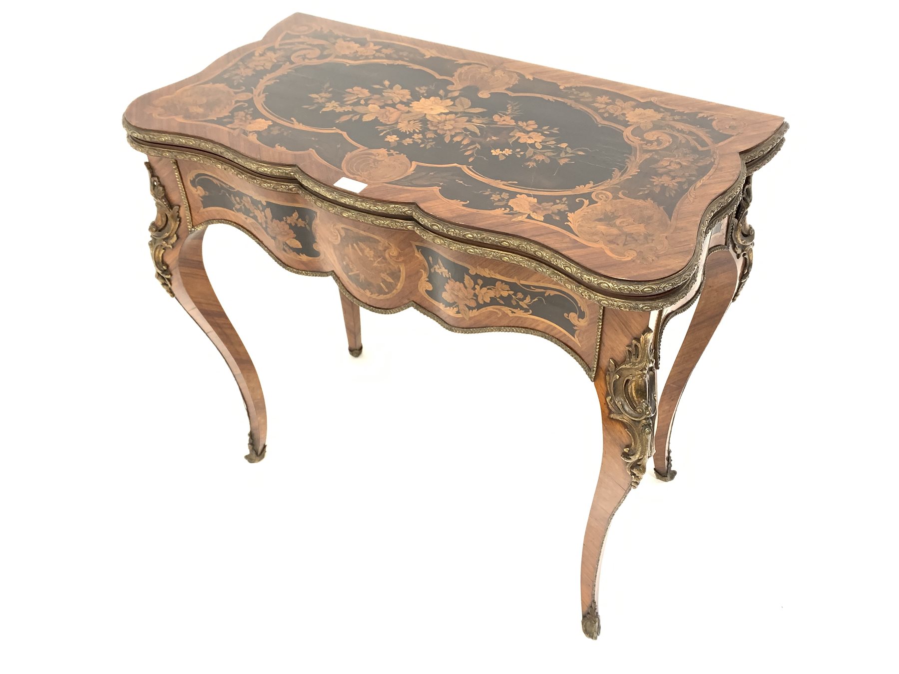 19th century French kingwood marquetry games table, the serpentine floral inlaid fold over revolvin - Image 2 of 10