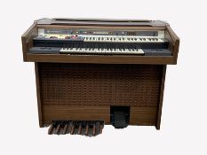 Hammond electric organ, model no. 2822KM serial no. 51384 (W110cm) and a quantity of sheet music,