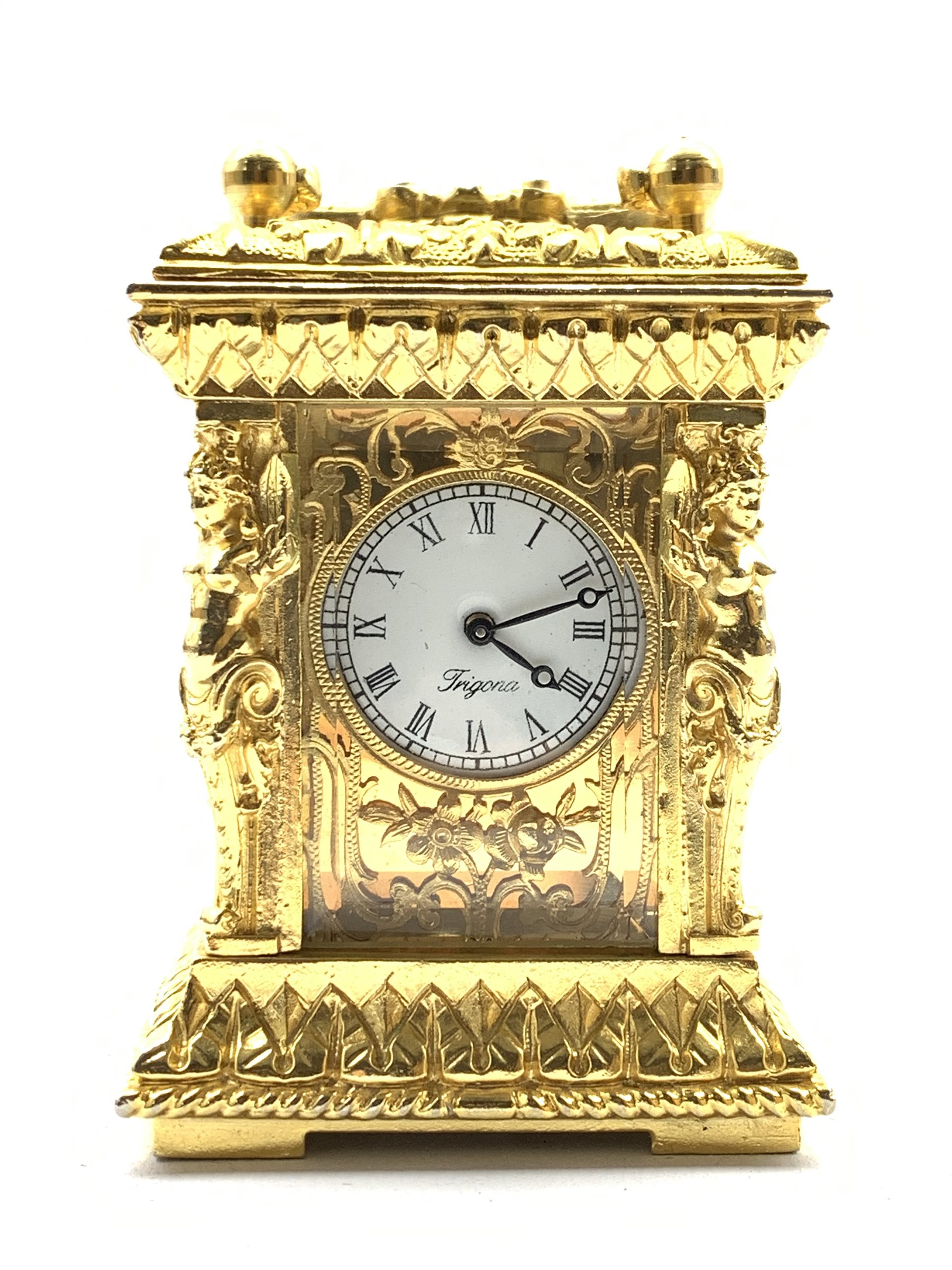 20th century miniature ornate brass carriage time piece, white enamel dial with Roman numeral chapt