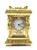 20th century miniature ornate brass carriage time piece, white enamel dial with Roman numeral chapt