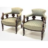 Pair late Victorian carved walnut framed tub shaped salon armchairs, upholstered in patterned green