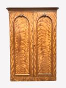 Victorian mahogany double wardrobe, with two arched panelled doors enclosing interior fitted with h