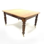 Victorian mahogany extending dining table, rectangular top with moulded edge raised on turned and r