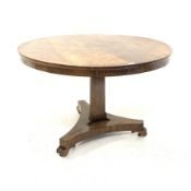 19th century rosewood pedestal centre table with circular top raised on panel sided pedestal, platf