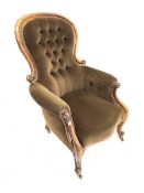 Victorian mahogany framed armchair, upholstered in deep buttoned brown velvet, with scrolled arm te