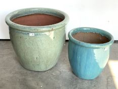 Large glazed terracotta plant pot (D59cm) and a similar pot, (D39cm)