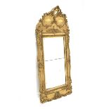 Late 19th century upright wall mirror with ornate leaf moulded gilt frame and two mirrored plates,