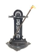 Victorian cast iron stick stand, decorated with mask and scrolled interlaced foliage, (W42cm) and t