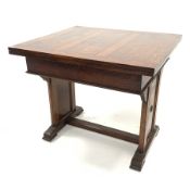 Early 20th century oak duo draw leaf table with panel end supports united by stretcher, 91cm x 81cm