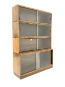 Early 20th century 'Simplex' oak stacking library bookcase with four shelves, each with sliding gla