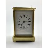 Early 20th century brass four glass carriage time piece, white enamel dial with Roman numeral chapt
