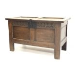 Early 18th century panelled oak coffer, carved frieze, on stile supports, W105cm, H61cm, D49cm