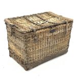 Large early 20th century wicker basket trunk, leather bound with cow hide, fitted with metal lock an