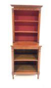Late 19th century French mahogany open bookcase, with figured frieze above two shelves enclosed by