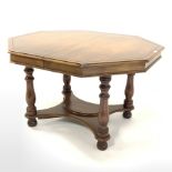 Victorian style walnut octagonal table, with turned supports united by under tier, 114cm x 130cm, H