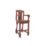 20th century Indo-Persian design carved and painted hardwood high chair, ram head arm terminals, pa