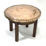 Mid 20th century circular copper top and mahogany table, metal label underneath 'Christopher Pratt a