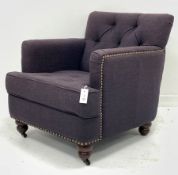 Armchair upholstered in buttoned fabric, turned feet with castors, W70cm, D86cm