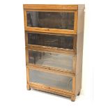 20th century oak 'Globe Wernicke' stacking library bookcase, four tiers enclosed by glazed doors, W8